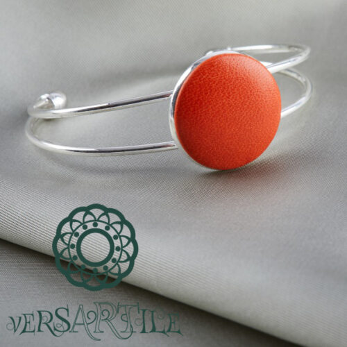 Élénk narancsszín bőrbetétes karkötő